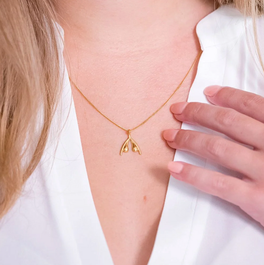 COLLIER OFFICIEL WOMANIZER GOLD CLITORIS